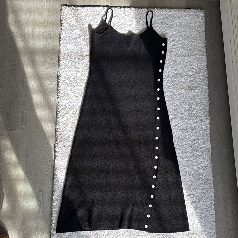 Elegant Black Dress with Button Detail